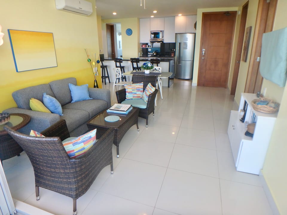 Living/dining area as seen from balcony with view to kitchen