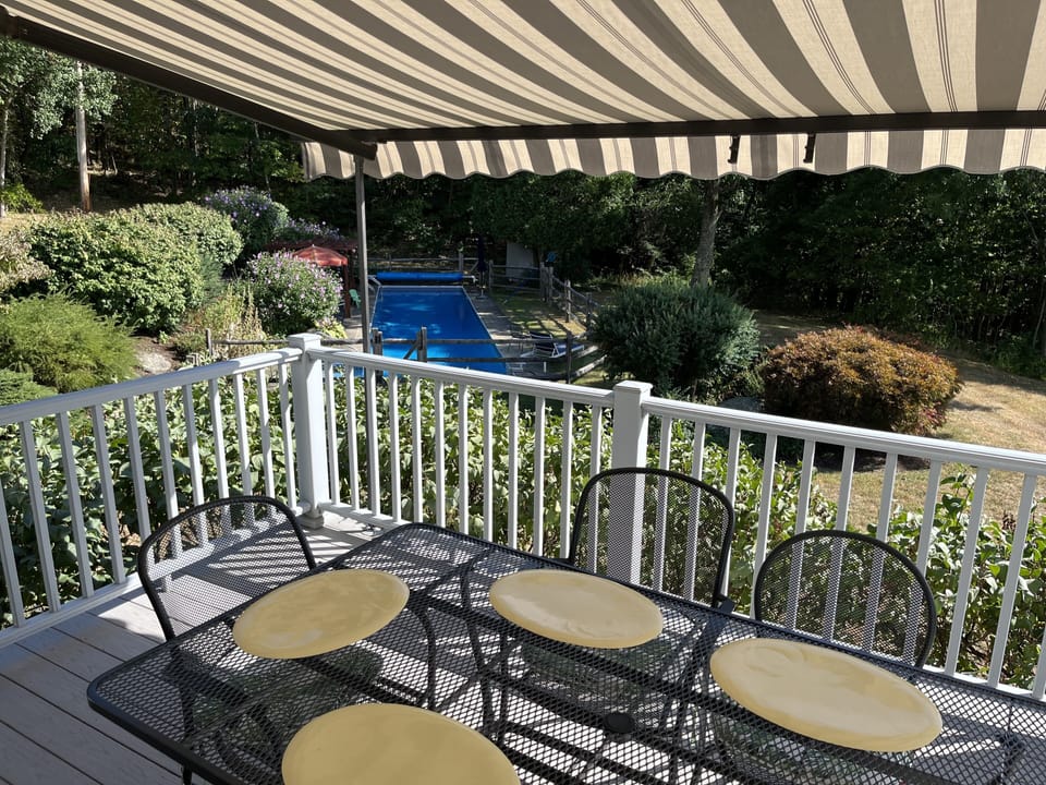On deck, outdoor table for seating 6 to 10 people