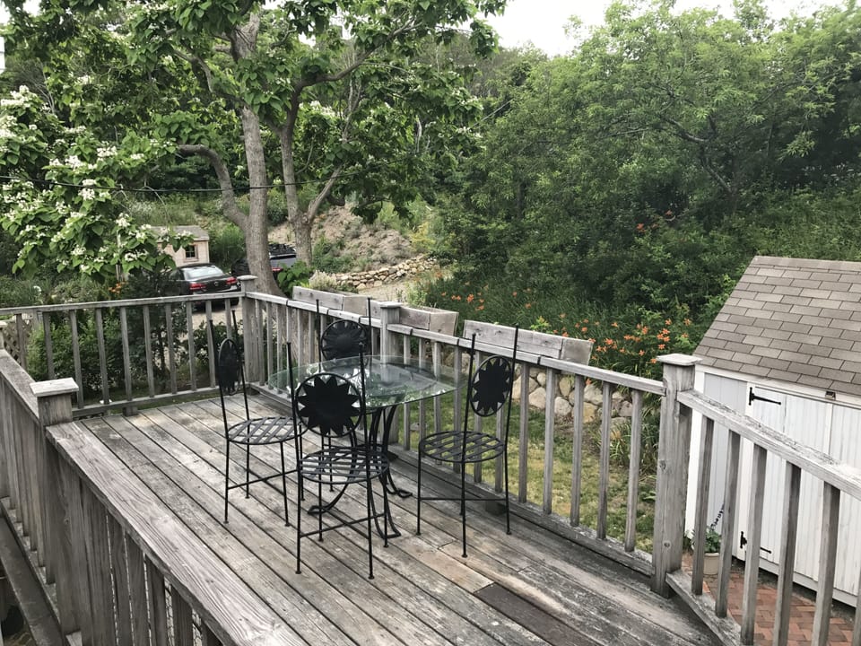 Private deck overlooking yard
