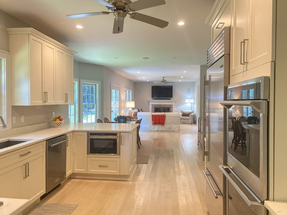 View from Kitchen, 6 person casual dining, family rooms beyond.