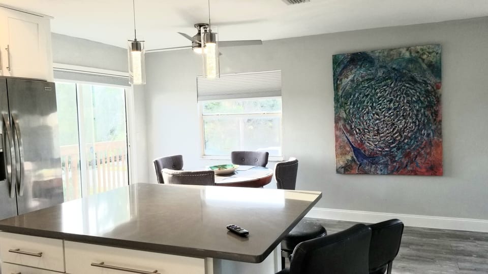 Kitchen table seats 4 and counter space 3