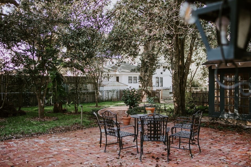 Brick courtyard behind the main house