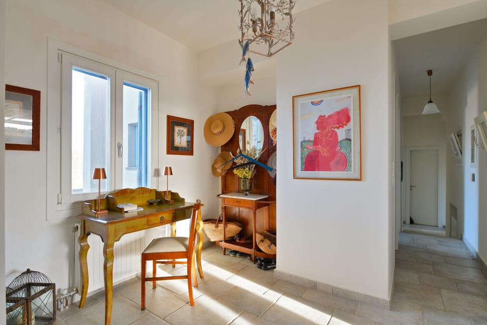 The hall leading to 3 of the bedrooms