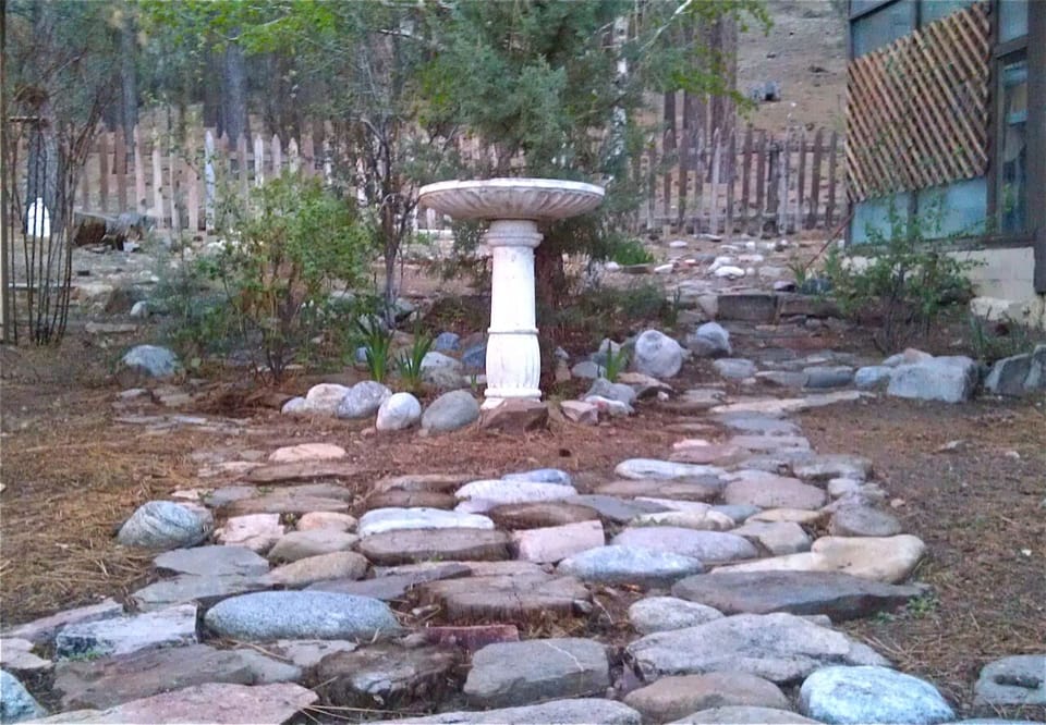 Hand-laid stone walk is typical of tender loving care that went into the Chalet.
