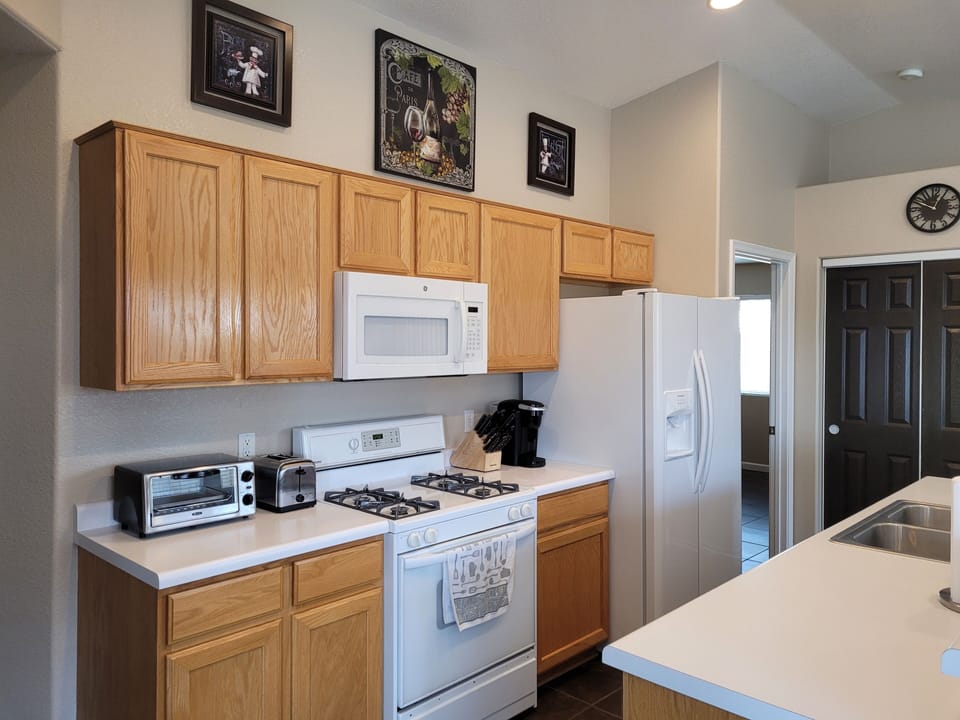 Kitchen, Well Stocked With the Necessities.