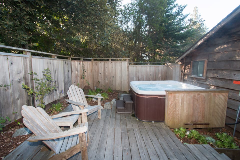 Private hot tub and sitting area on the deck