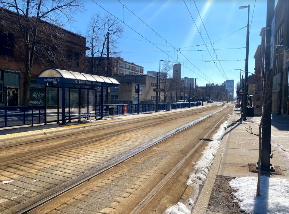 Centre St Light Rail stop is around the corner