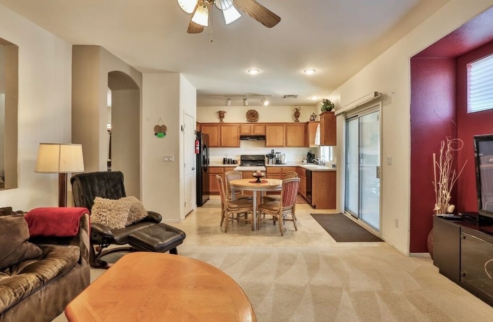 Open kitchen flowing into the family room—great for gathering and meals.