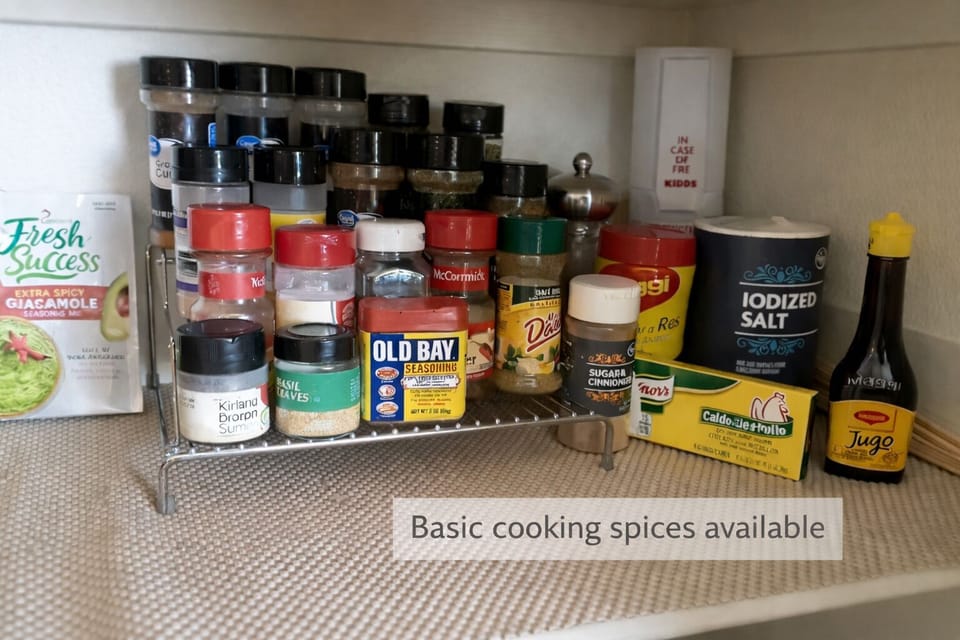 Well-stocked kitchen with essential seasonings for home cooking.
