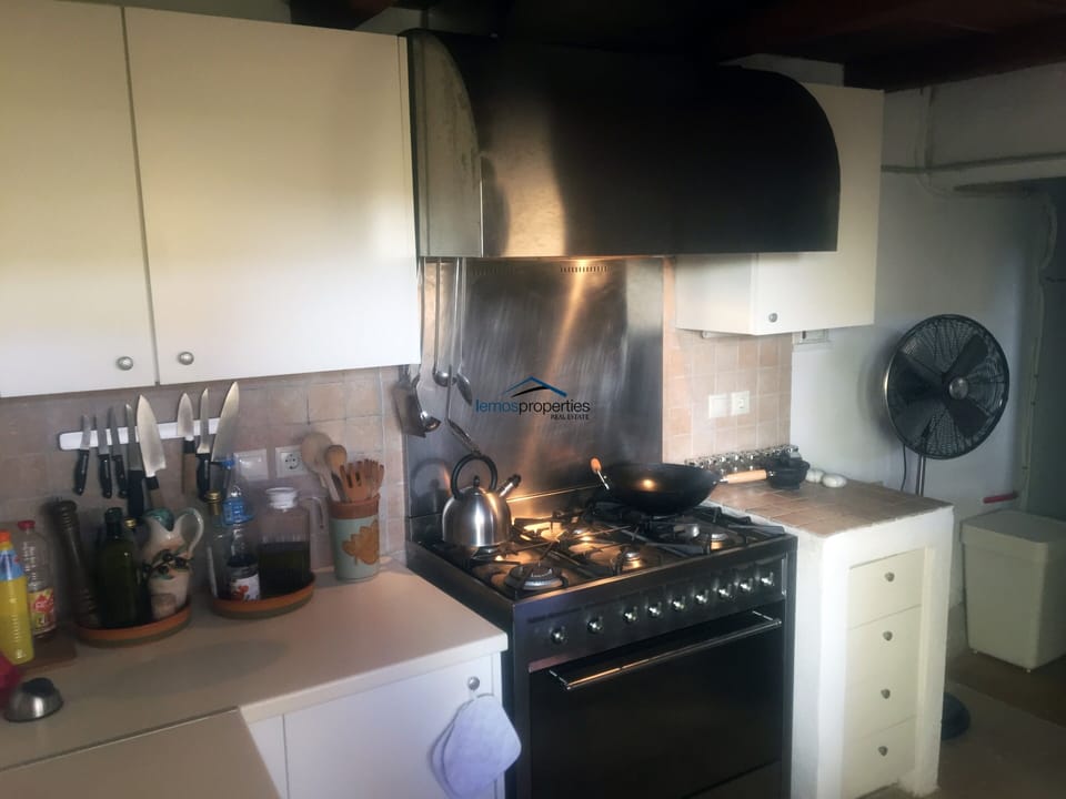 The second kitchen next to one of the outdoor dining areas