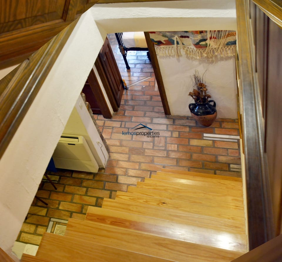 The stairs leading to the bedrooms