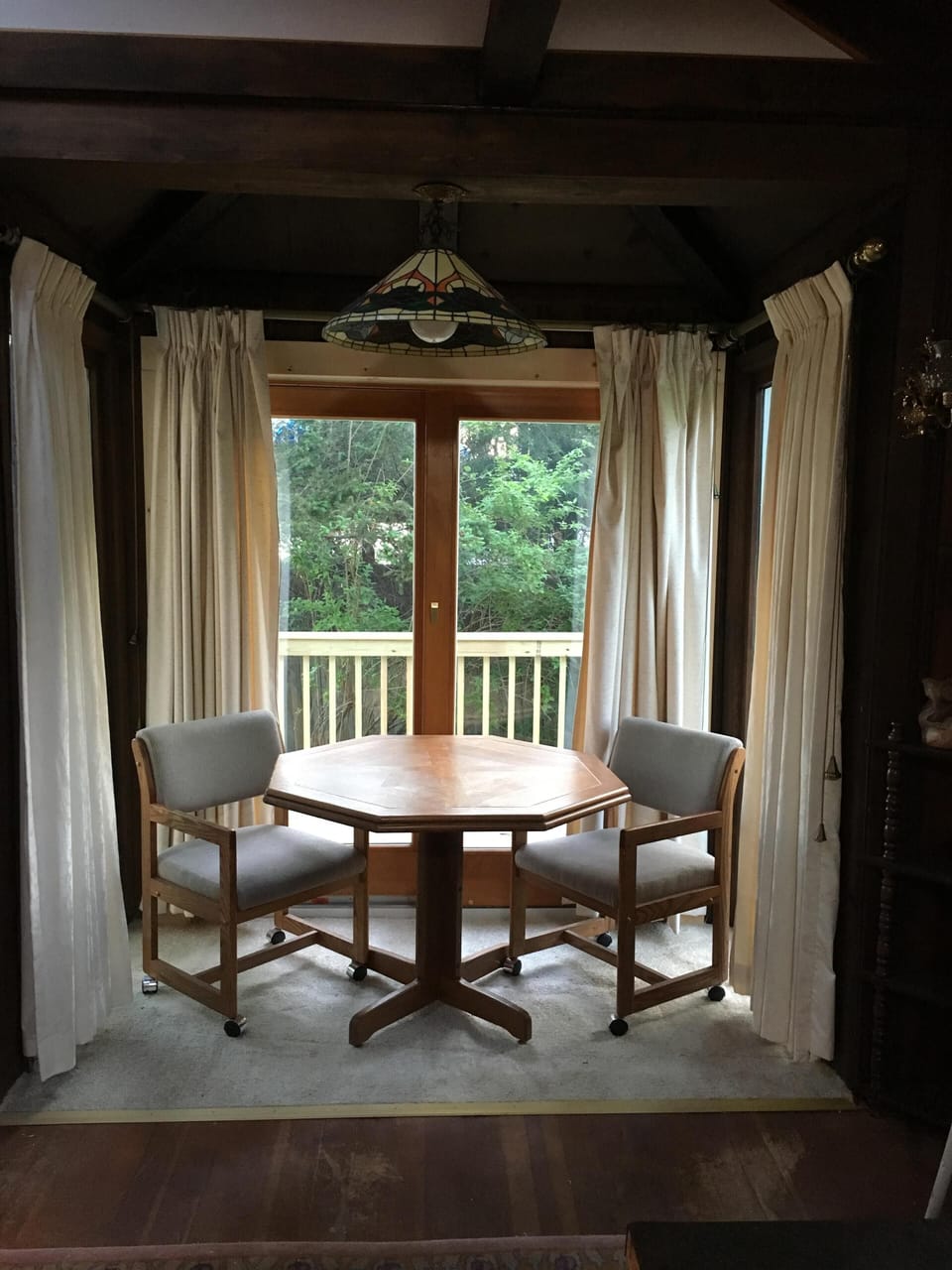 B'fast nook, gorgeous lake views from here, or out slider onto sitting porch.