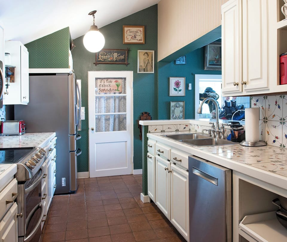 Freshly updated kitchen is well equipped for those who love to cook.  A large pantry and laundry area leads off the kitchen to the hot tub.