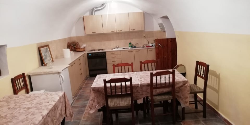 Fully equipped kitchen and dining area on the ground floor.