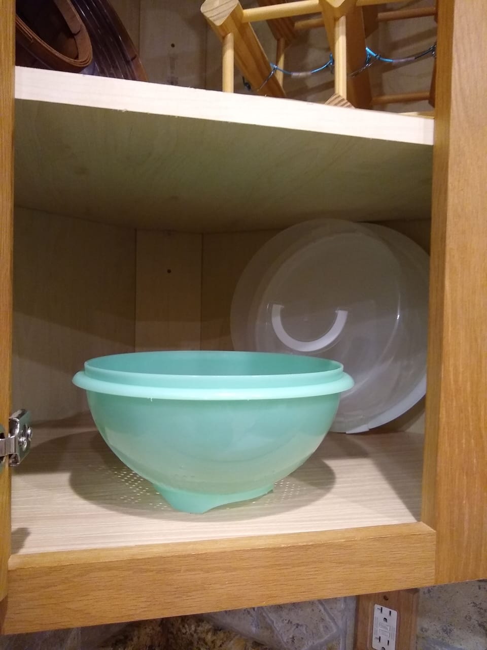 Colander & Cake Taker in Lower Corner Cupboard.