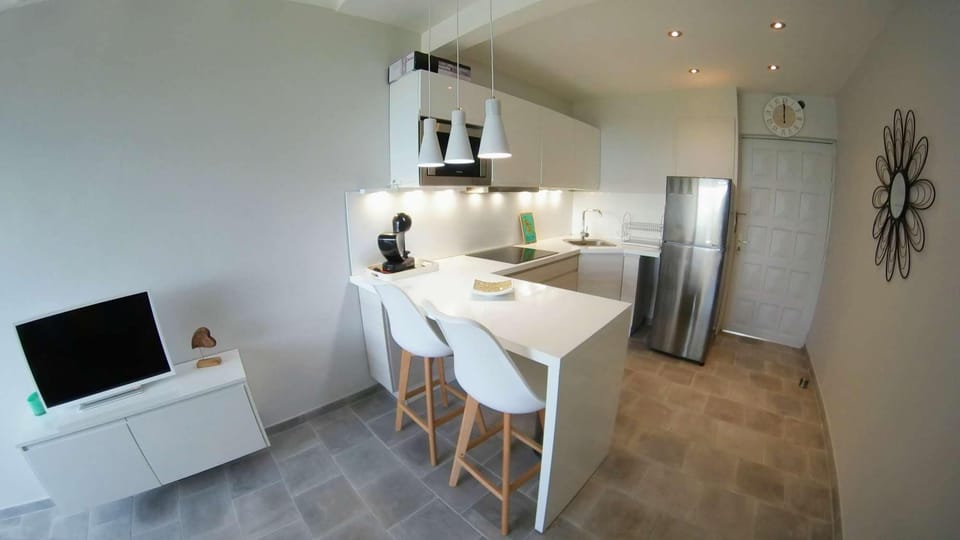 TV and kitchen area