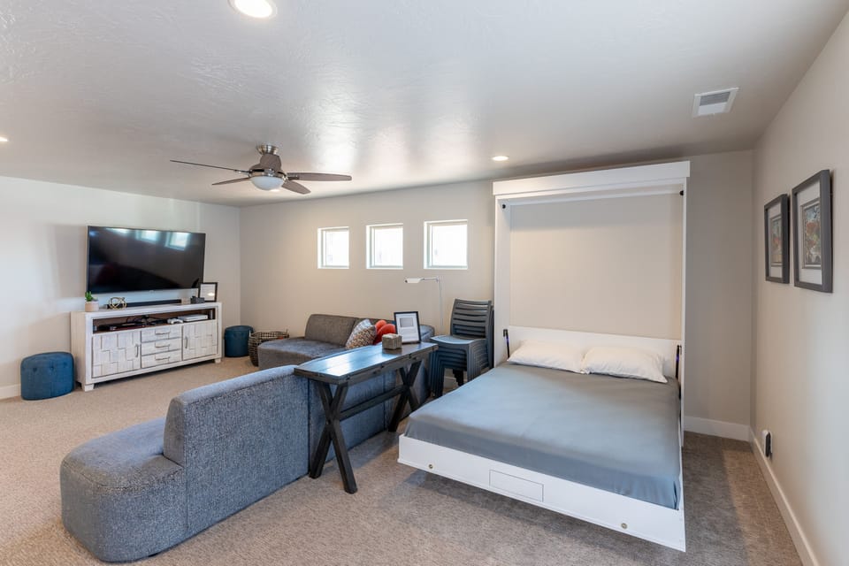 Upstairs Family Room - This upstairs family room includes a Queen Murphy bed.