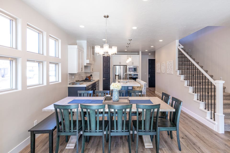 Dining Table - The beautiful wood dining room set can comfortably seat 12 people.