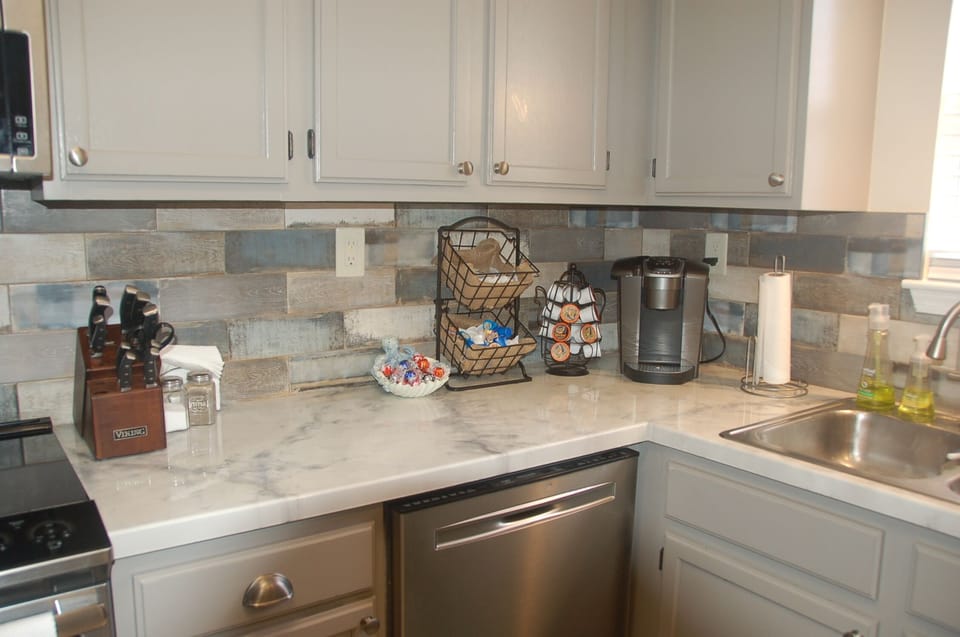 Keurig coffee maker, a selection of coffee, tea and hot chocolate.