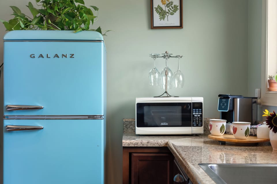 Coffee station, microwave, and full-size refrigerator for an easy stay.
