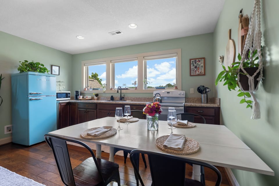 Fully stocked kitchen and dining area for easy meals, coffee, and tea.