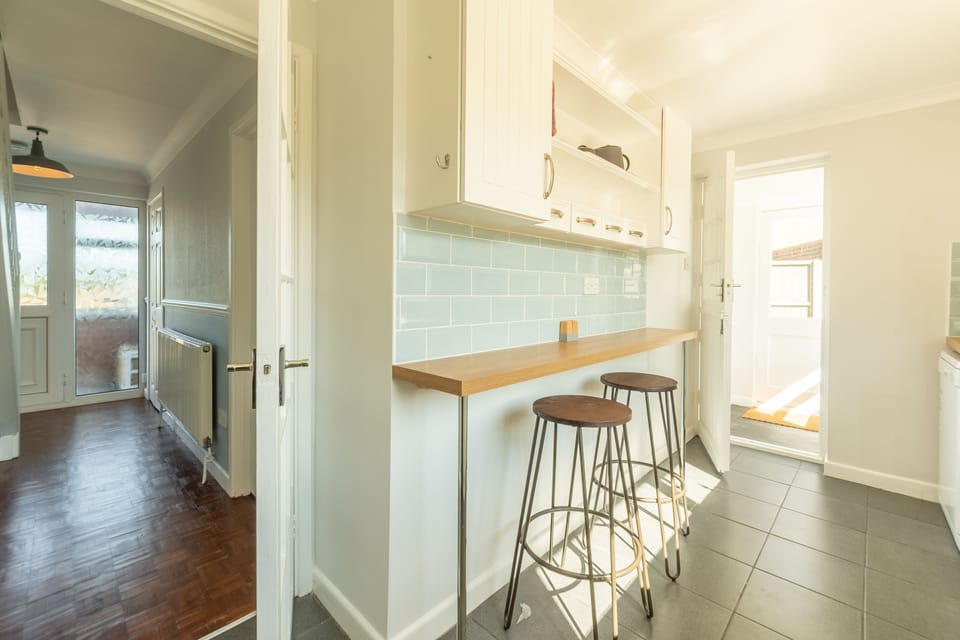 Ground floor: Bar seating in the kitchen