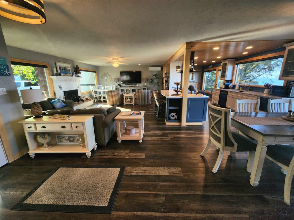 View of open living area, kitchen and dining. 