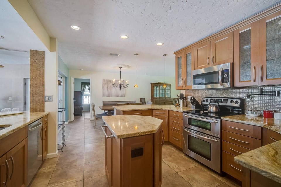 Modern touches meet classic charm in this spotless, fully equipped kitchen. Ready for your next culinary adventure!