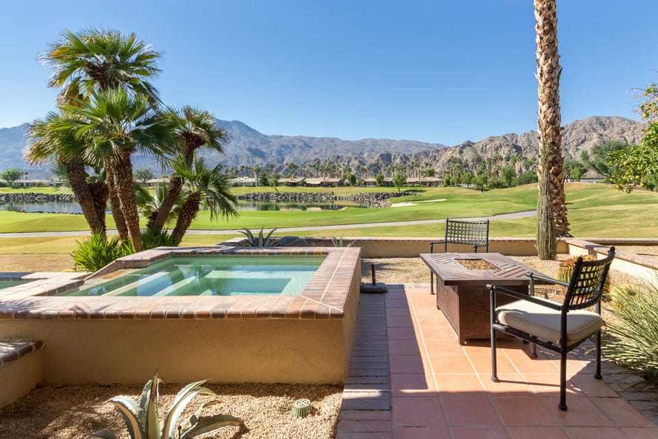 Incredible golf course and mountain views from your backyard hot tub.