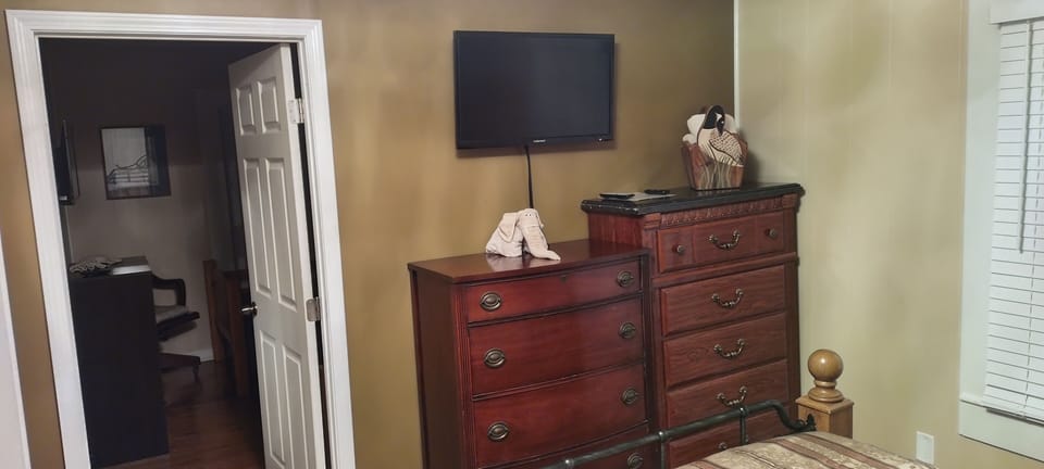 Bedroom with queen & Roku TV.