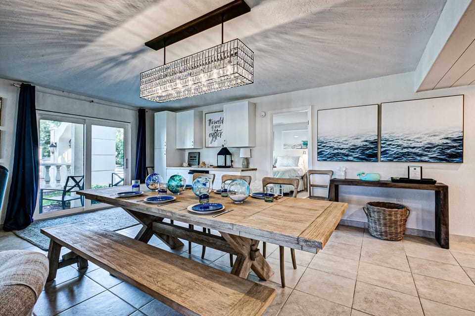 This large composite dining table will seat your group easily.  Enjoy family meals together with ease.