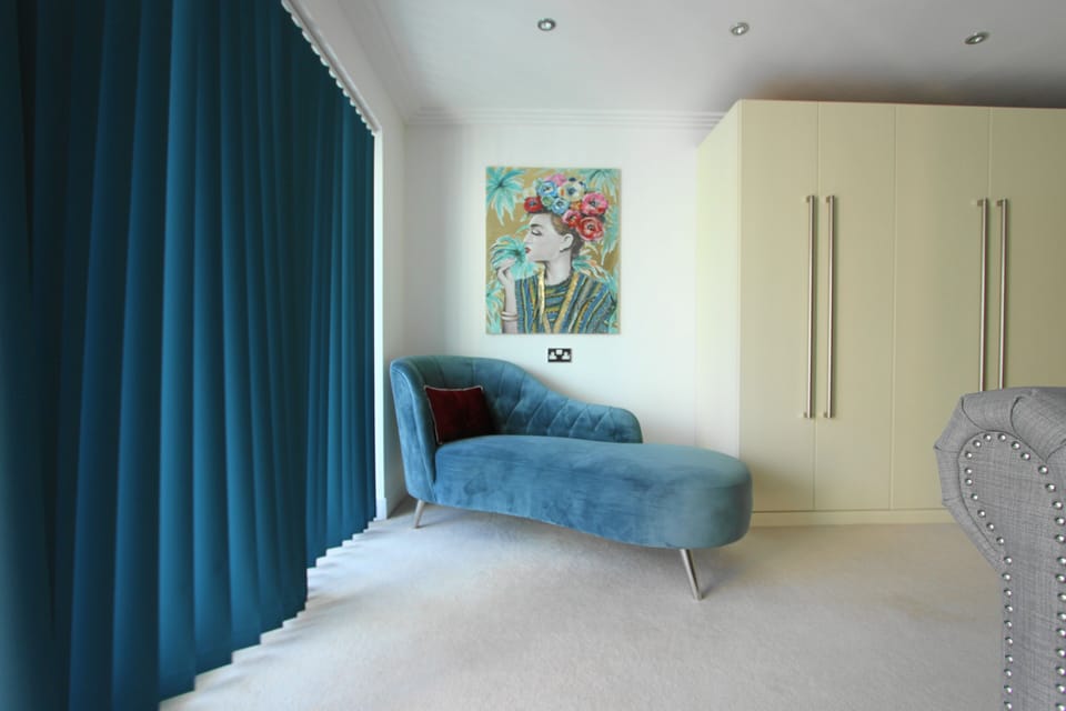 Relaxation corner in master suite, with direct access to the balcony