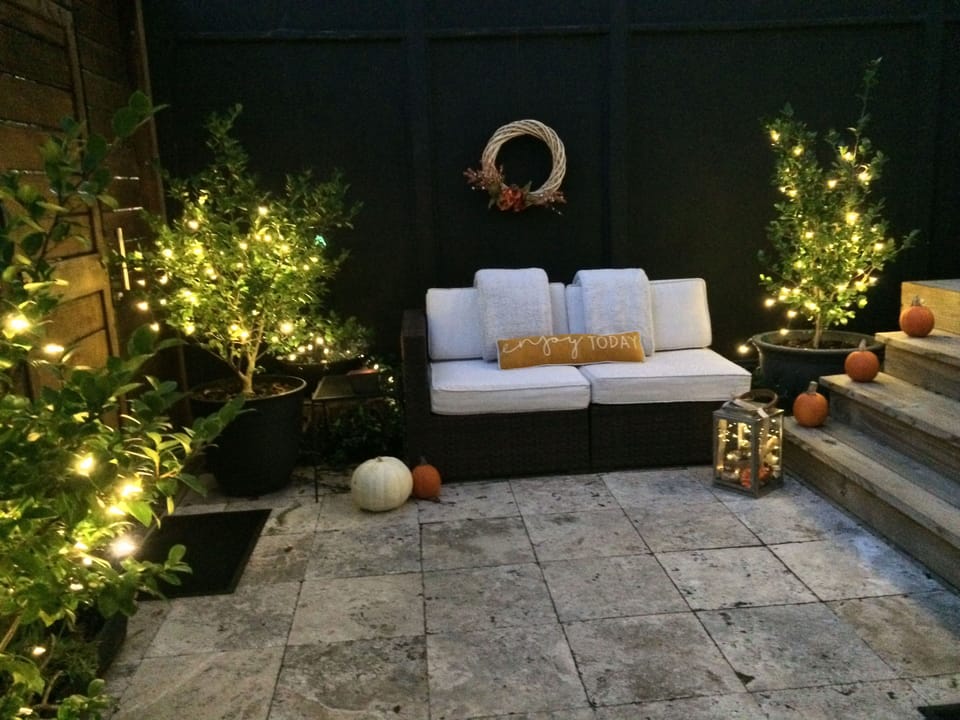 Outdoor sofa and twinkling lights for a romantic evening!