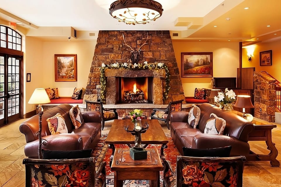 Sink into leather sofas and savor fireside après-ski warmth