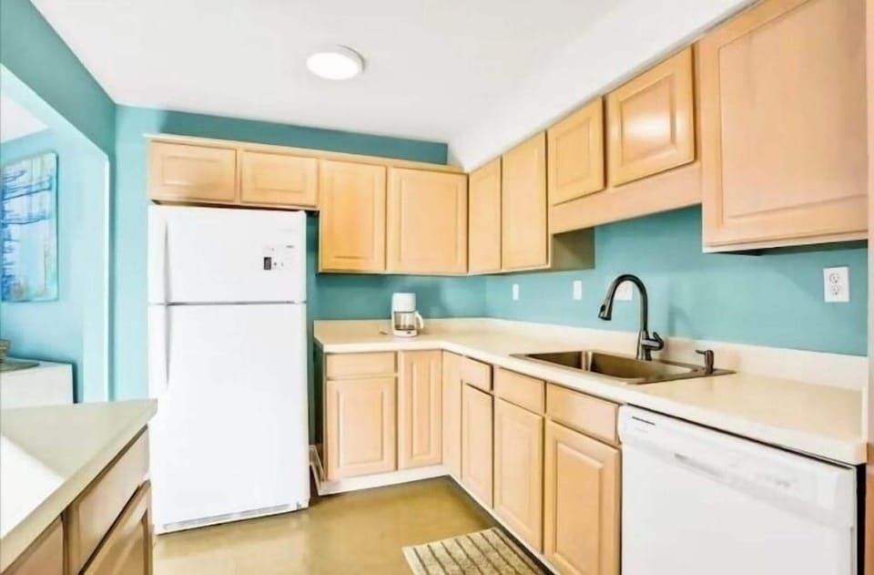 Kitchen with lots of countertop space and large sink basin