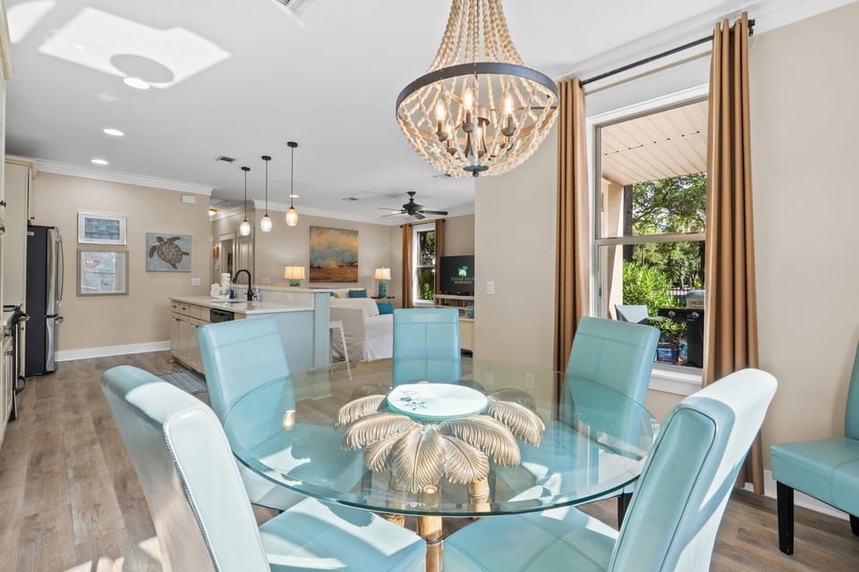 Beautiful dining space with comfortable seating for up to 8 guests.  More seating at kitchen bar.