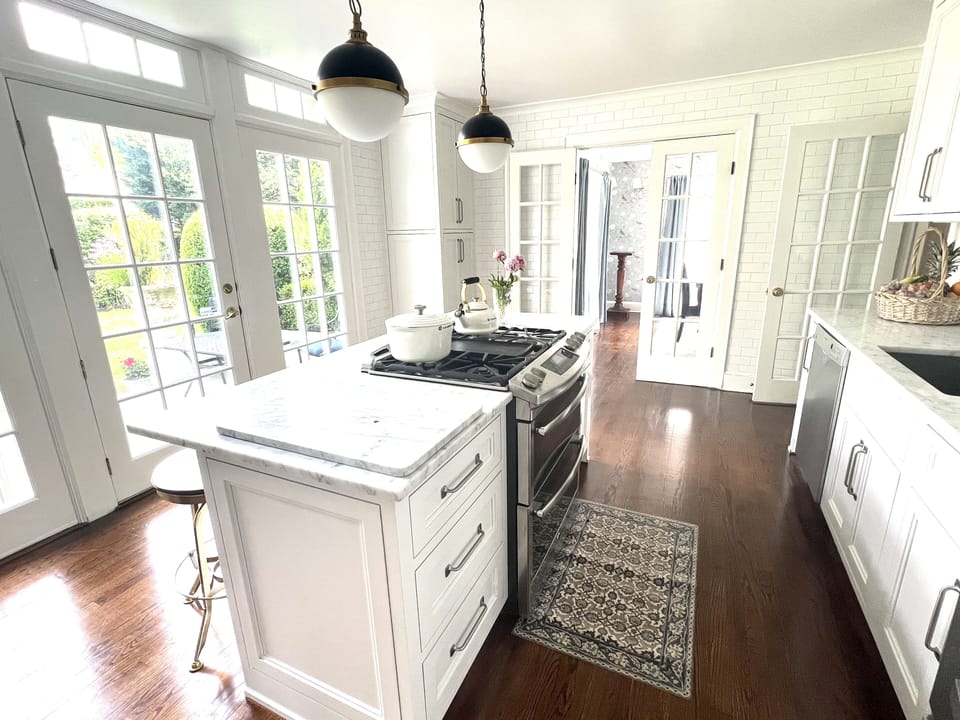 Kitchen with French doors to Patio and Gardens