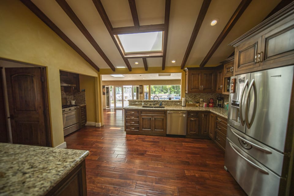 State of the art appliances including a gas stove, dishwasher and refrigerator.