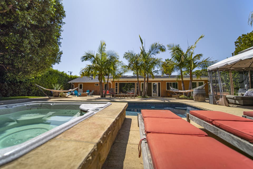Jacuzzi and lounge chairs.