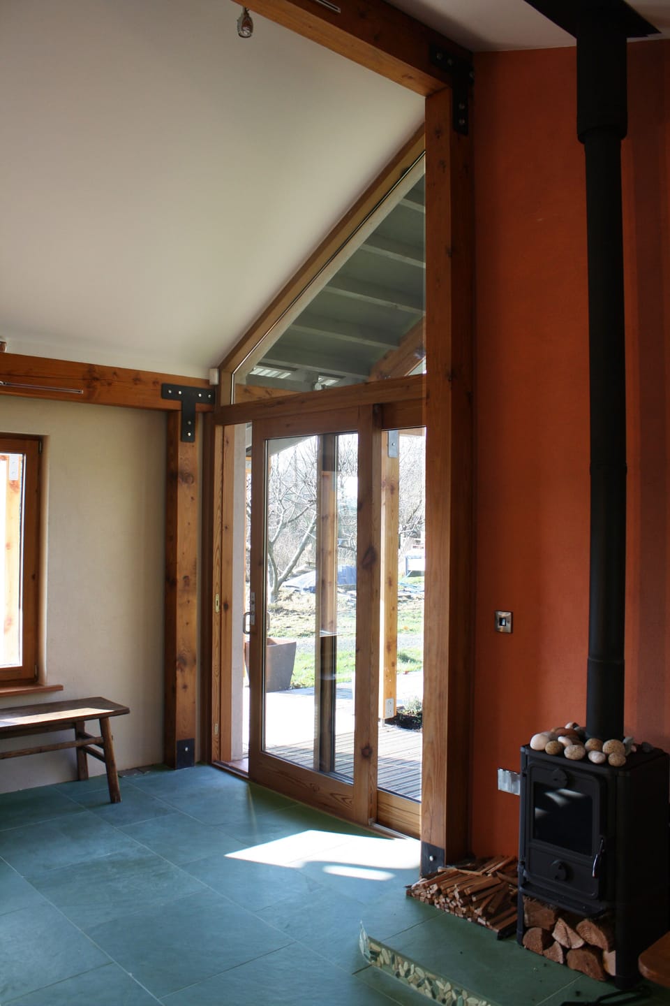 Wood-burning stove & doors out to the garden