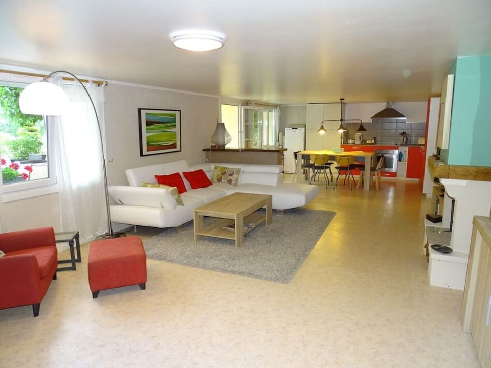 Living area with large open plan kitchen 