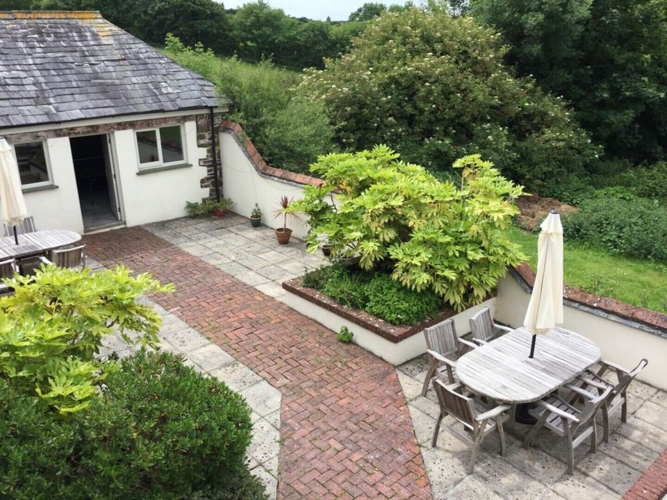 View from Coach cottage to patio and games room