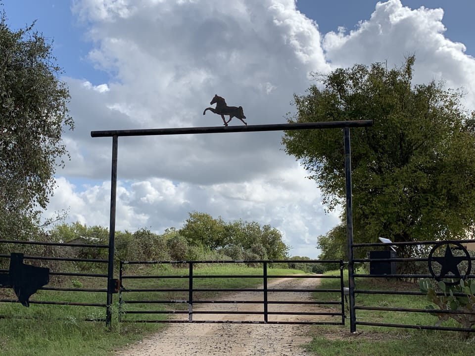 Entry gate for 1.3 mi peaceful ride to home east of Hwy 46 & 123 & 123 Business.