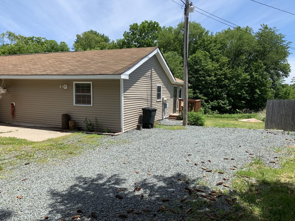 Front of home with private driveway.