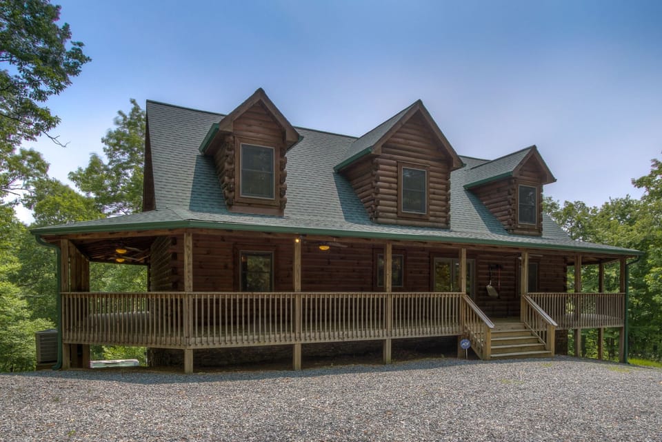 Back of the house where you park and enter. Parking area is relatively flat.