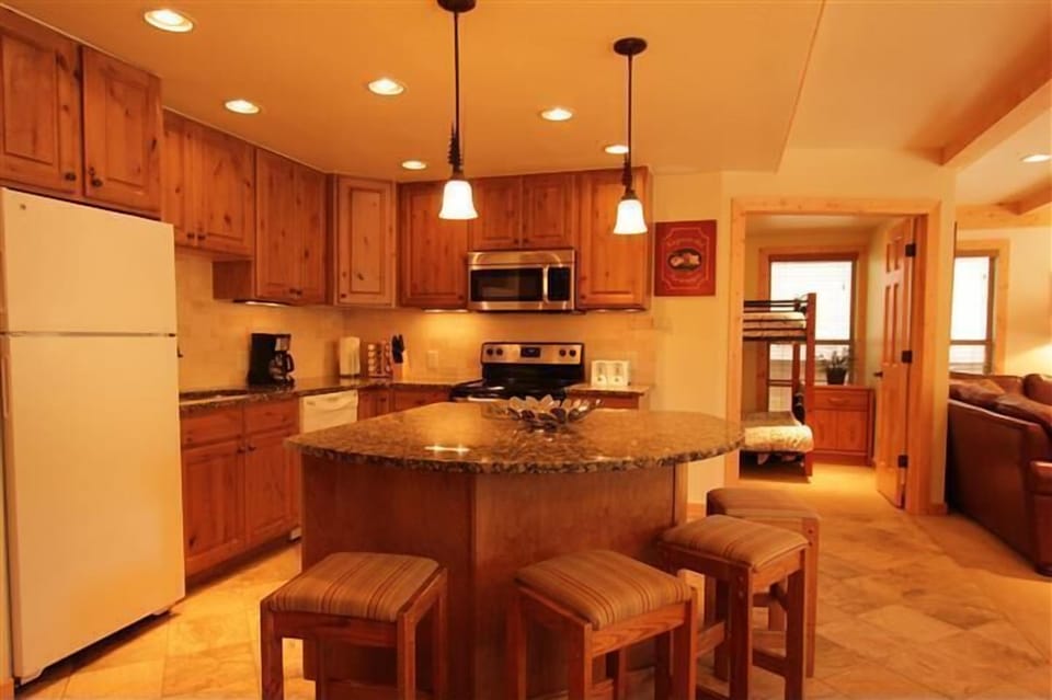 New Stainless Steel Microwave and Corian Top Stove with Oven