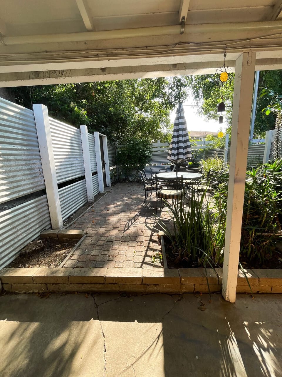 Front outdoor patio with charcoal bbq