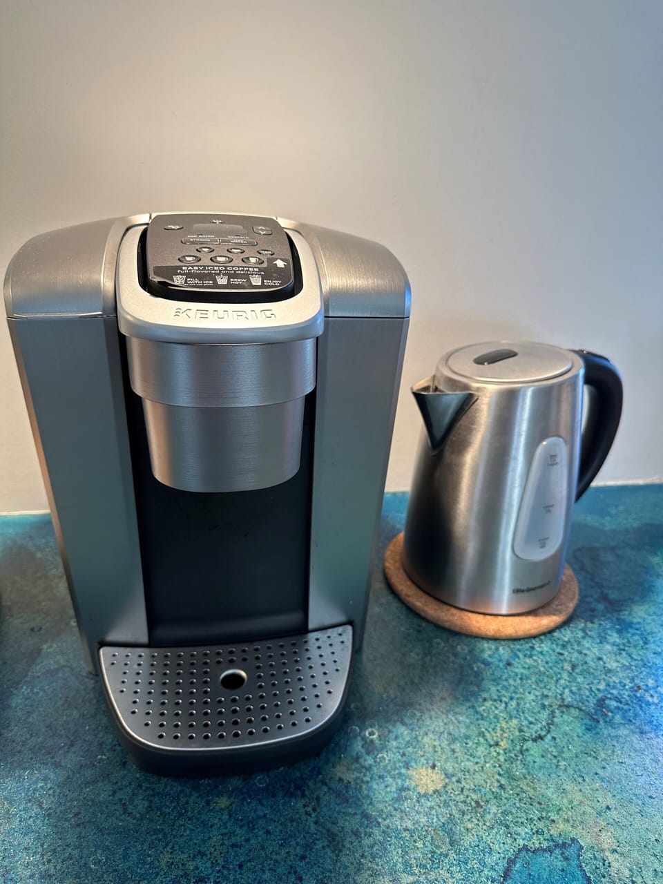 New coffee maker, tea kettle, and plenty of tea, coffee, sweeteners and creamer
