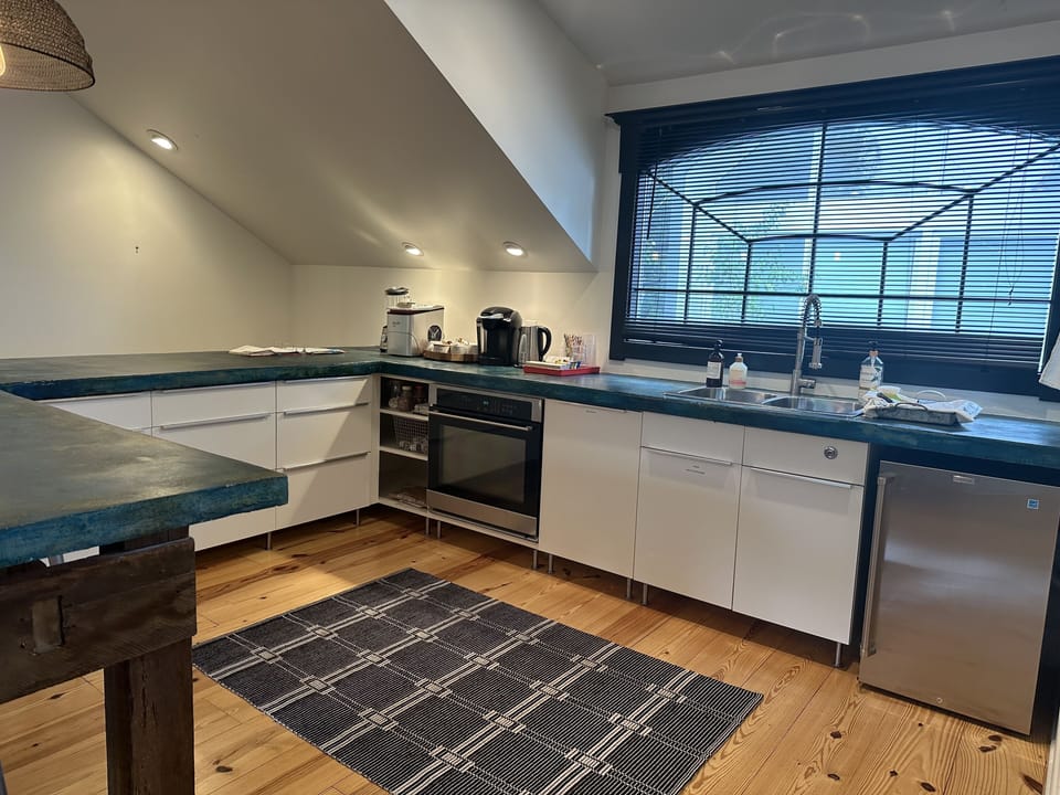 Kitchen is well equipped for cooking and hosting friends