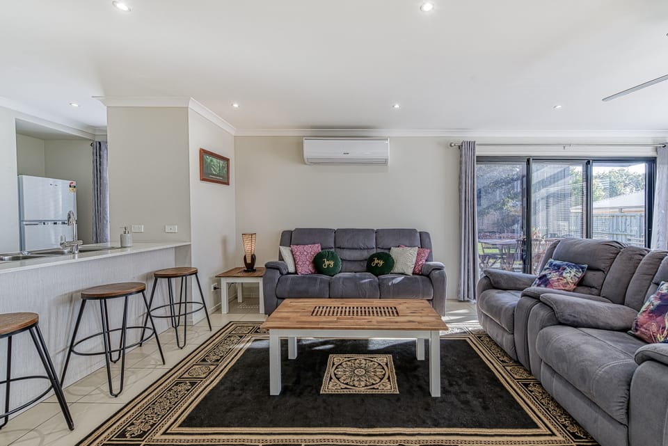 Downstairs living area with smart TV and free Netflix